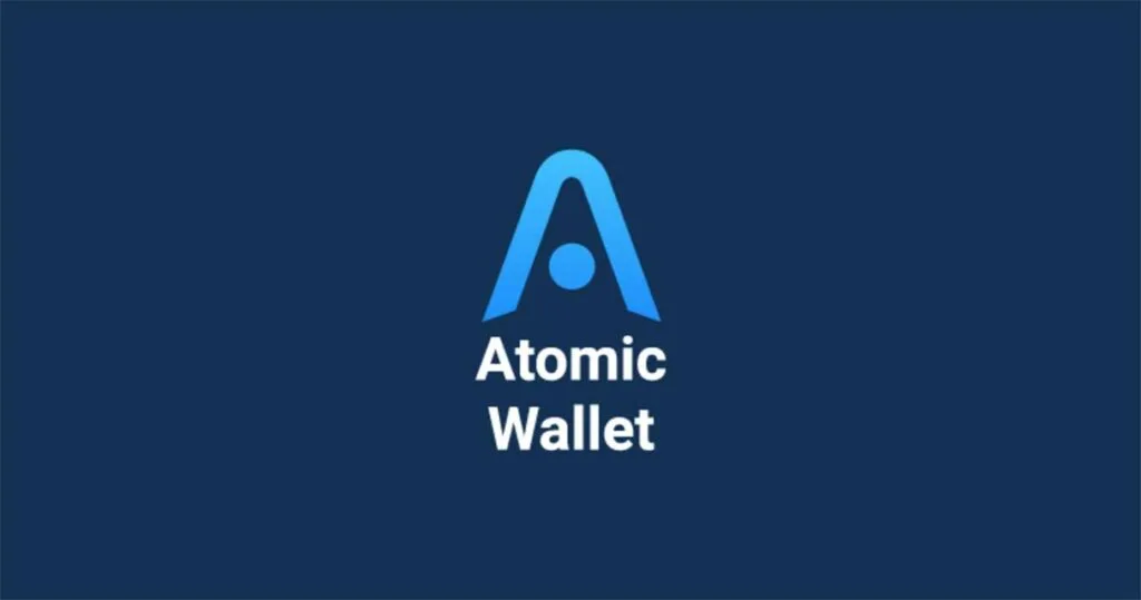 نوشته Atomic Wallet در کنار نماد آن در پس زمینه سرمه‌ای