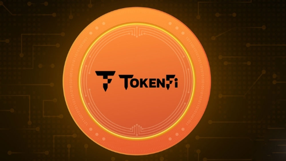 طراحی نماد TokenFi با رنگ نارنجی روی پس زمینه مشکی